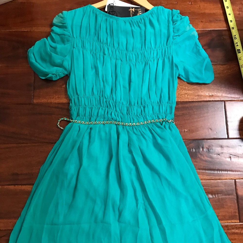Cute teal green dress with chain detail